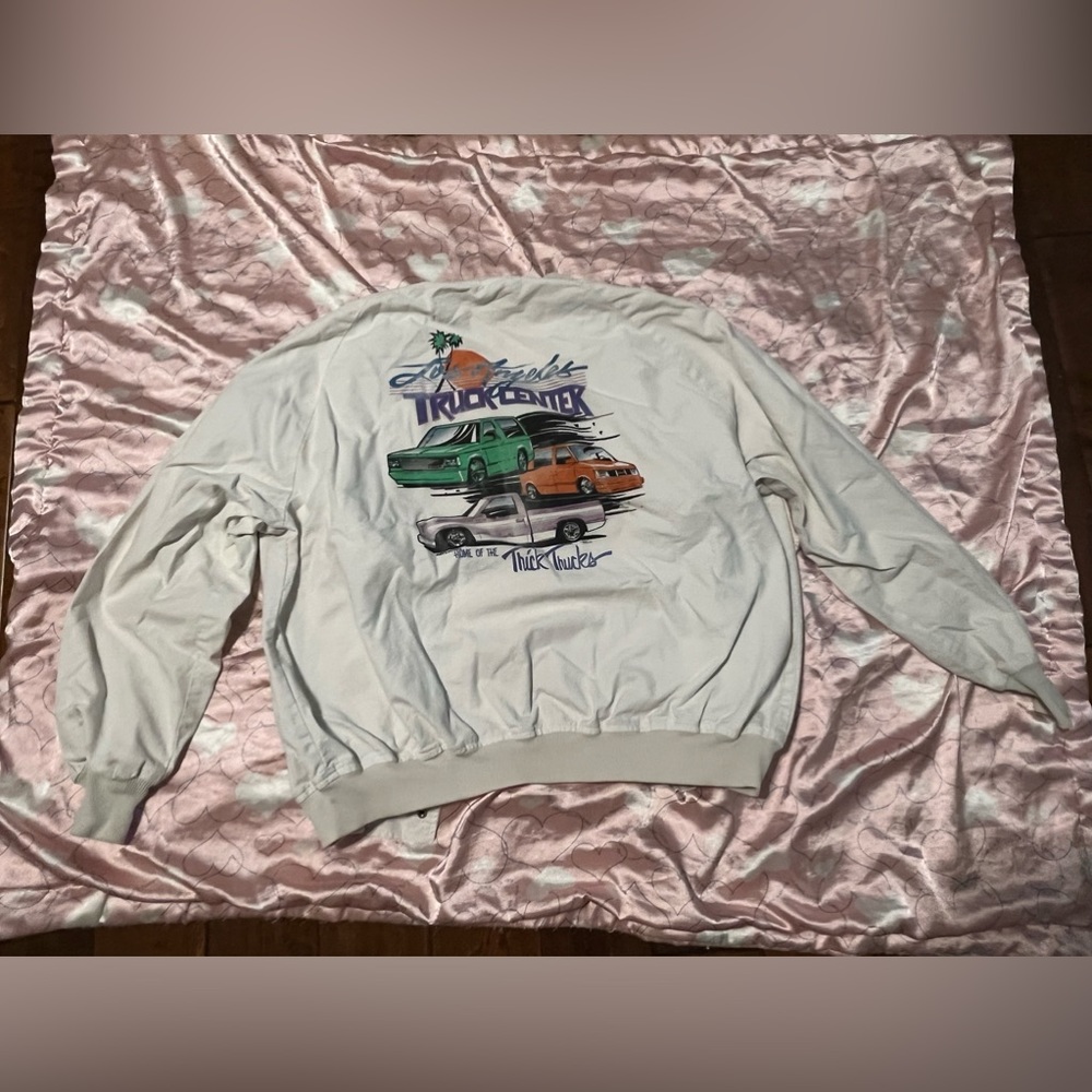 Odyssey Apparel white bomber jacket
